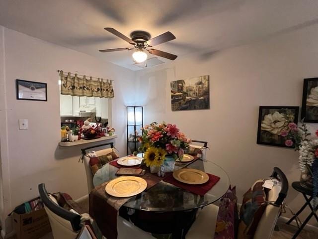 dining area featuring ceiling fan