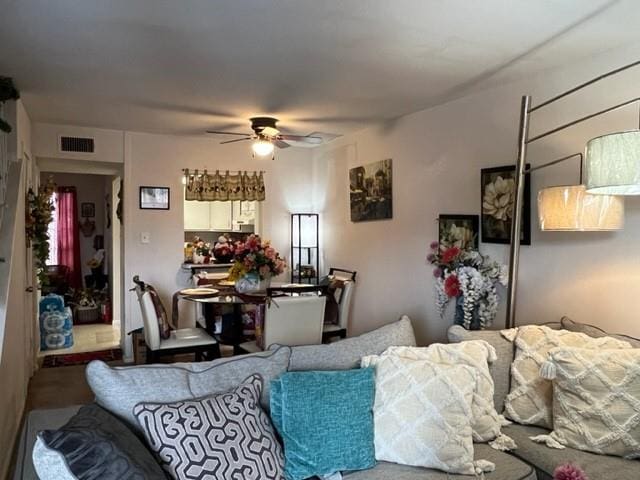 living room with ceiling fan