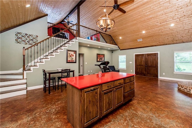 kitchen featuring high vaulted ceiling, wood ceiling, a kitchen island, and ceiling fan with notable chandelier