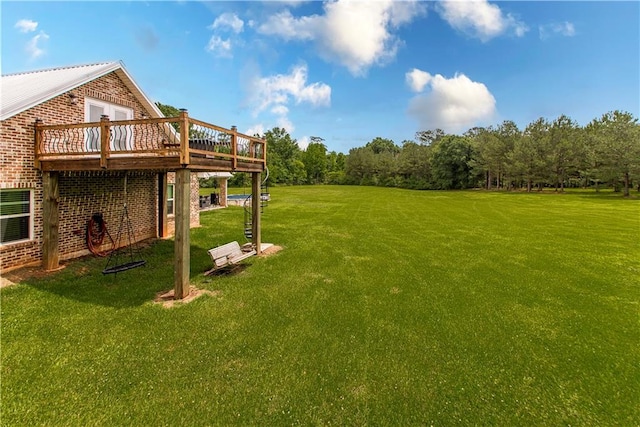 view of yard featuring a wooden deck