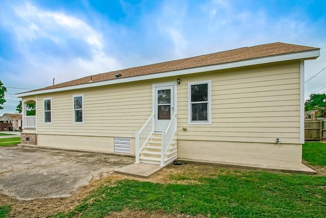 back of property with a patio area