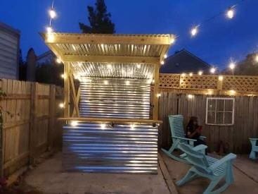 patio terrace at twilight featuring a pergola