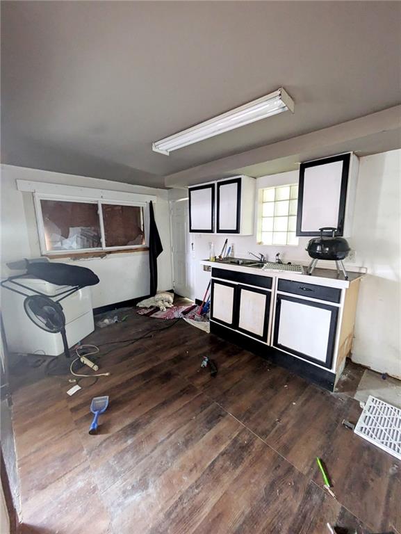 kitchen with hardwood / wood-style floors