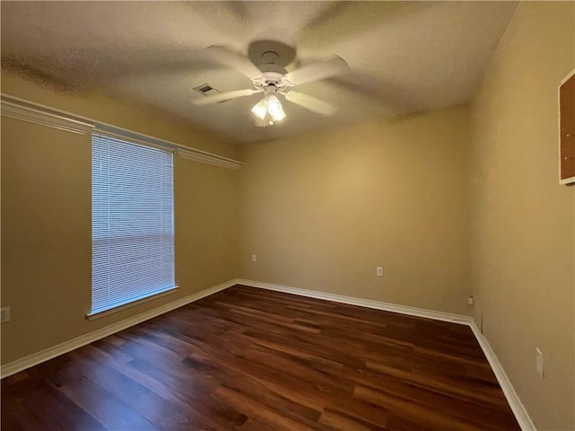 unfurnished room featuring a textured ceiling, ceiling fan, and hardwood / wood-style floors