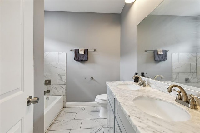 full bathroom featuring tile floors, double vanity, toilet, and tiled shower / bath combo