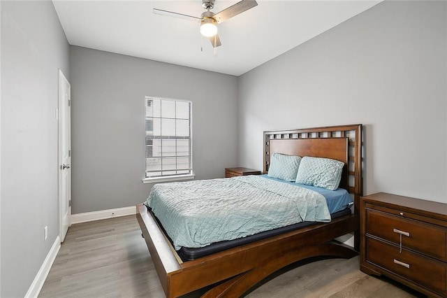 bedroom featuring ceiling fan and wood-type flooring