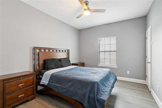 bedroom featuring ceiling fan and hardwood / wood-style floors