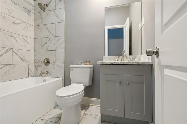 full bathroom featuring tiled shower / bath, oversized vanity, toilet, and tile floors