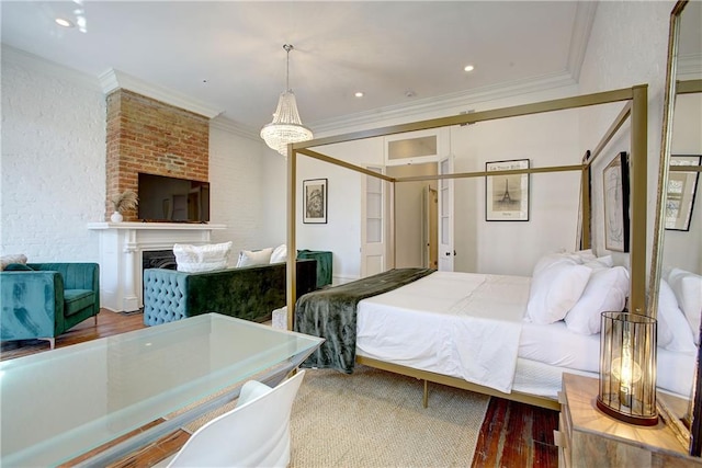 bedroom featuring hardwood / wood-style flooring and crown molding