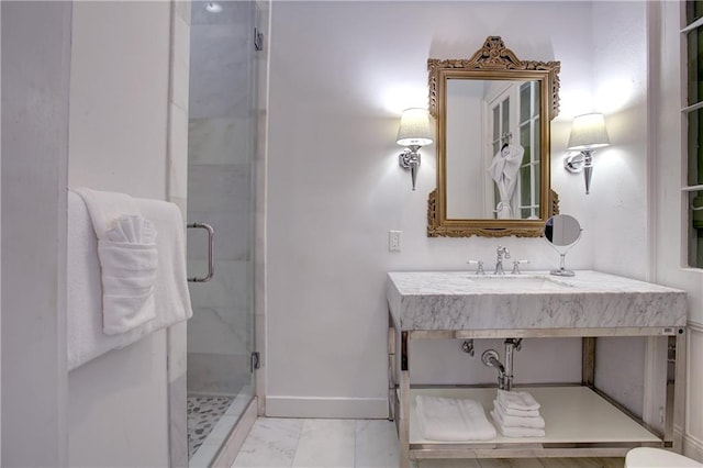 bathroom featuring walk in shower, tile flooring, and vanity