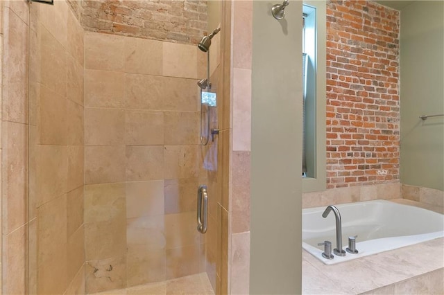 bathroom with shower with separate bathtub