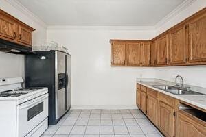 kitchen with sink, stainless steel dishwasher, ventilation hood, white range with gas cooktop, and ornamental molding