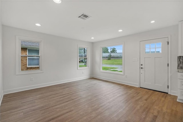 entrance foyer with hardwood / wood-style floors