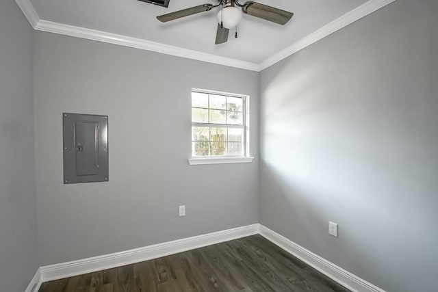 spare room with dark hardwood / wood-style flooring, ornamental molding, and ceiling fan