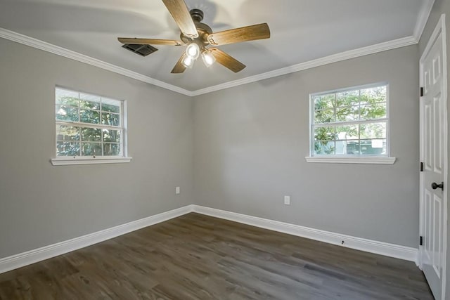 empty room with ornamental molding, dark hardwood / wood-style floors, and ceiling fan