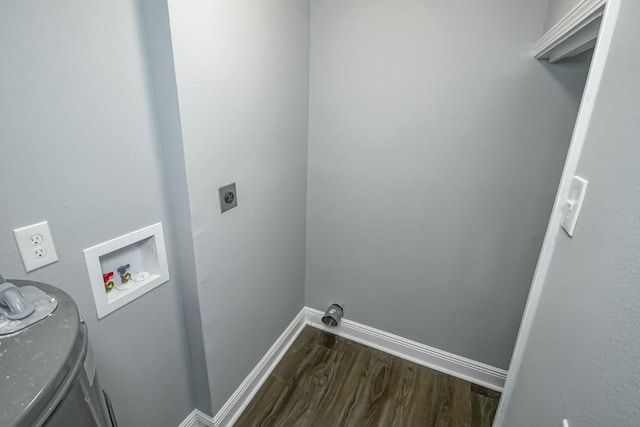 clothes washing area featuring dark hardwood / wood-style floors, washer hookup, and electric dryer hookup