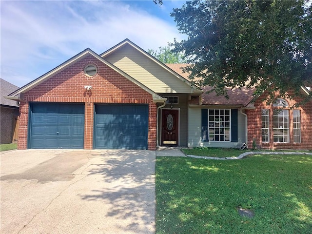 view of front of house with a front lawn and a garage