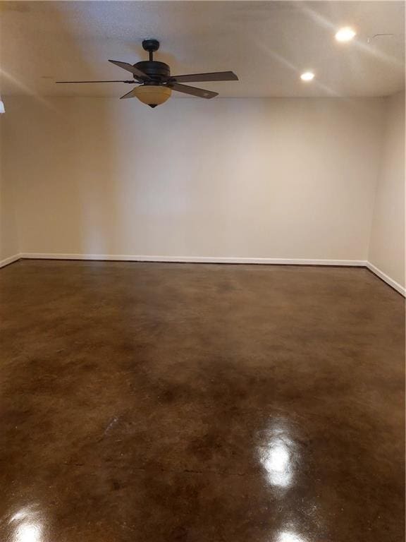 empty room featuring ceiling fan