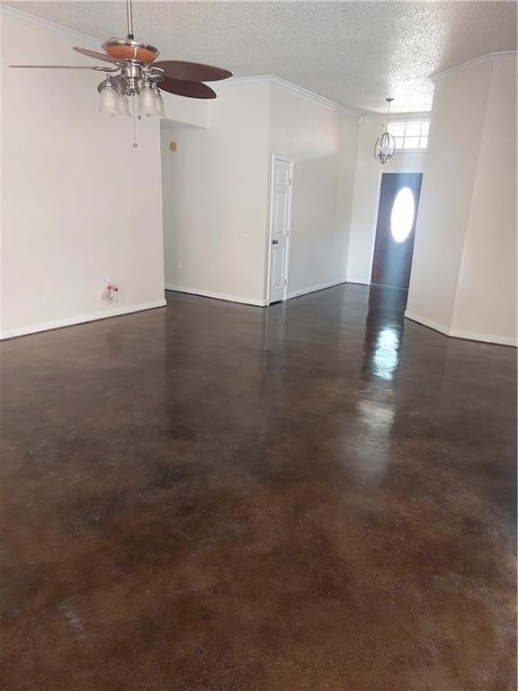 spare room with a textured ceiling and ceiling fan