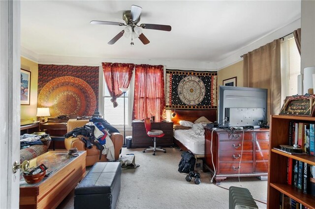 living room featuring ceiling fan and carpet flooring