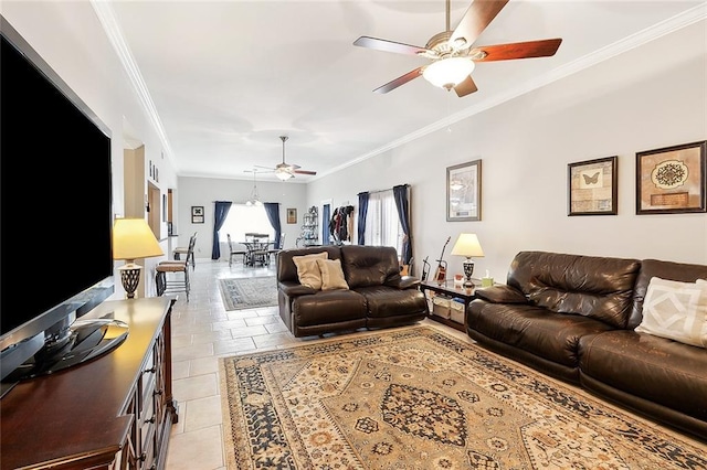 tiled living room with ceiling fan and crown molding