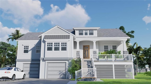 view of front facade featuring a garage, a front yard, and a porch