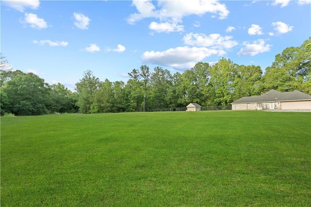 view of yard with fence