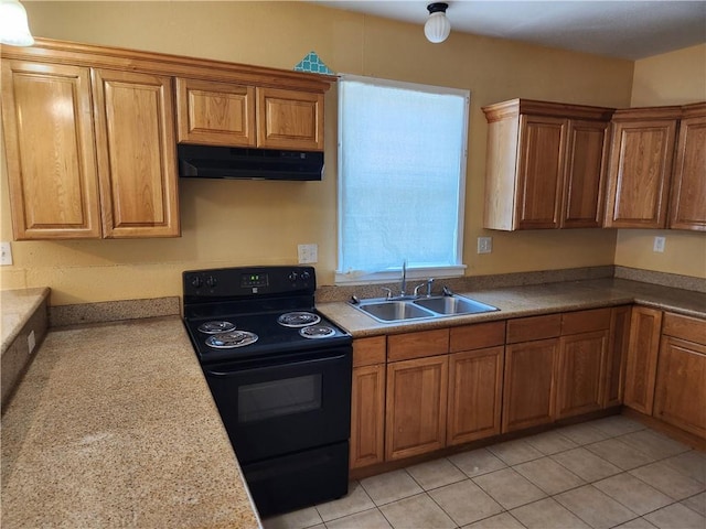 kitchen with black / electric stove, sink, and light tile floors