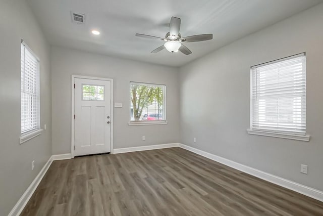 entrance foyer with baseboards, visible vents, dark wood finished floors, a ceiling fan, and recessed lighting