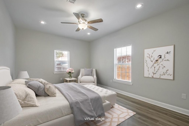 bedroom featuring baseboards, dark wood-style flooring, and recessed lighting