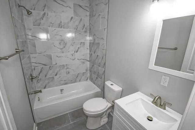 bathroom with toilet, bathtub / shower combination, vanity, and tile patterned floors