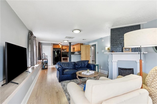 living room featuring light hardwood / wood-style flooring