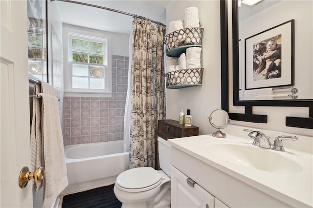 full bathroom with shower / tub combo, toilet, and large vanity