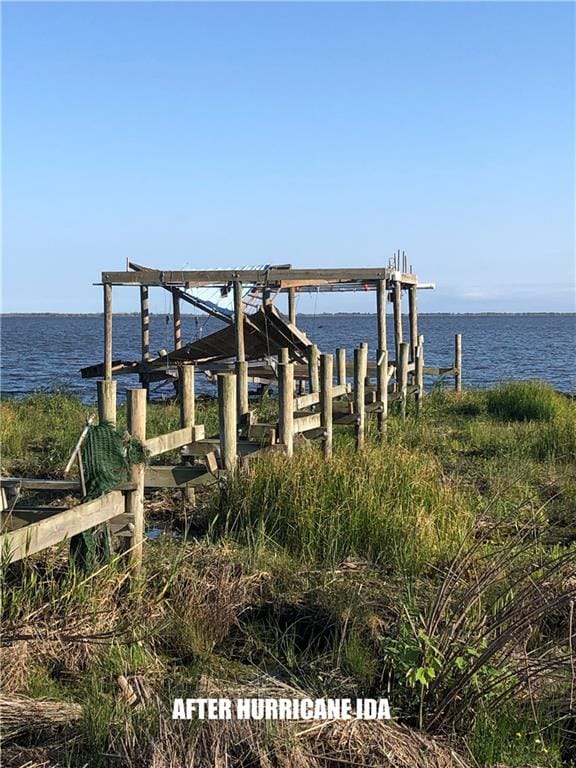 dock area featuring a water view