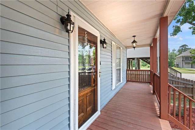 wooden deck featuring covered porch