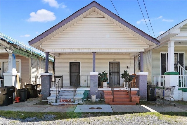 bungalow-style house featuring covered porch