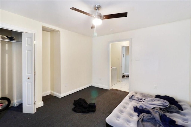 unfurnished bedroom featuring ceiling fan, carpet floors, and a closet