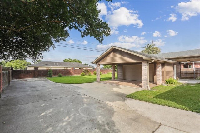 205 Stonehaven Dr, Belle Chasse, LA 70037 - exterior space with a garage and a carport