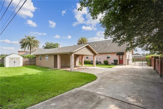 205 Stonehaven Dr, Belle Chasse, LA 70037 - single story home with central air condition unit, a front yard, and a storage unit