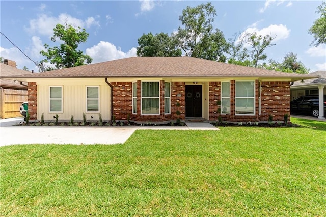 ranch-style home with a front yard