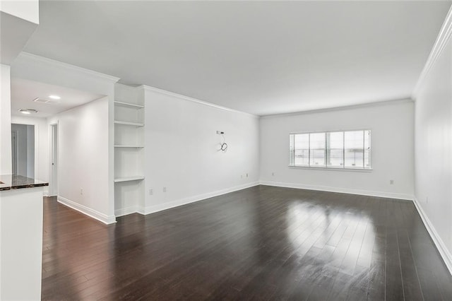 unfurnished living room featuring crown molding and dark hardwood / wood-style floors