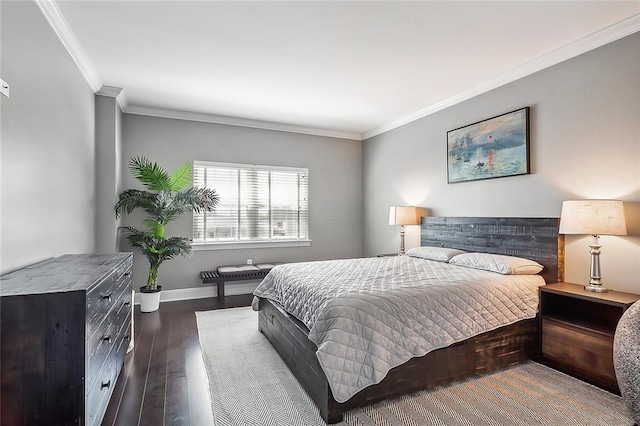 bedroom with dark hardwood / wood-style floors and ornamental molding