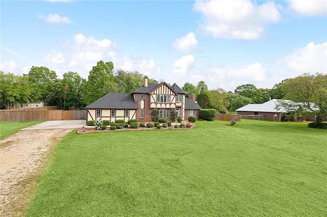 view of front of property with a front lawn