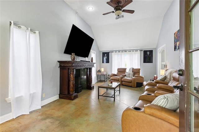 living room featuring lofted ceiling and ceiling fan