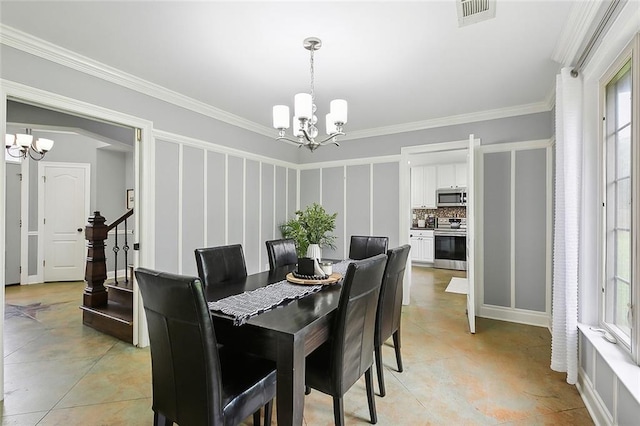 dining area featuring crown molding, light tile patterned flooring, a chandelier, and a wealth of natural light