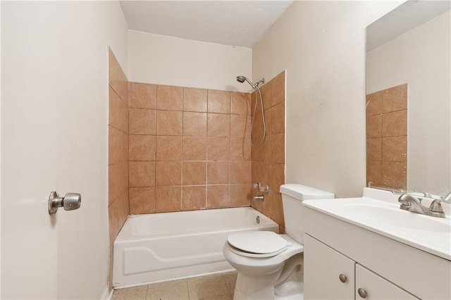 full bathroom featuring vanity, toilet, tiled shower / bath combo, and tile patterned flooring