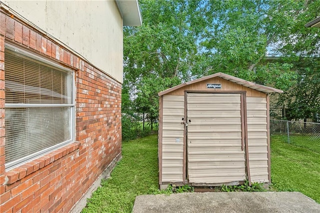 view of outdoor structure with a yard