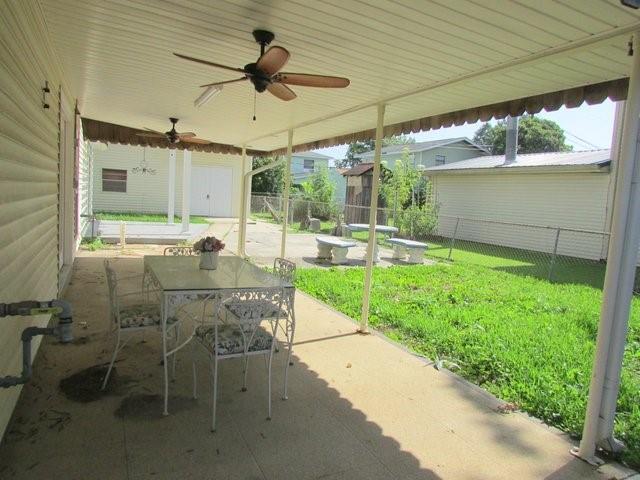 view of patio / terrace featuring ceiling fan