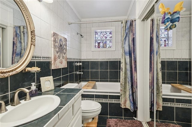 full bathroom featuring vanity, toilet, shower / bathtub combination with curtain, and ornamental molding