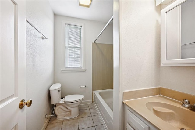 full bathroom featuring tile patterned flooring, vanity, toilet, and washtub / shower combination